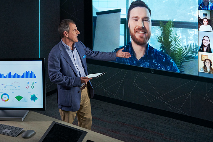 A teacher conducts a virtual financial literacy class on Zoom.
