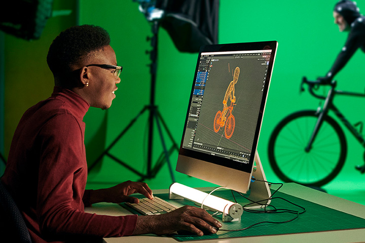 A student immersed in an animation project, combining skills and imagination for a dynamic learning experience.