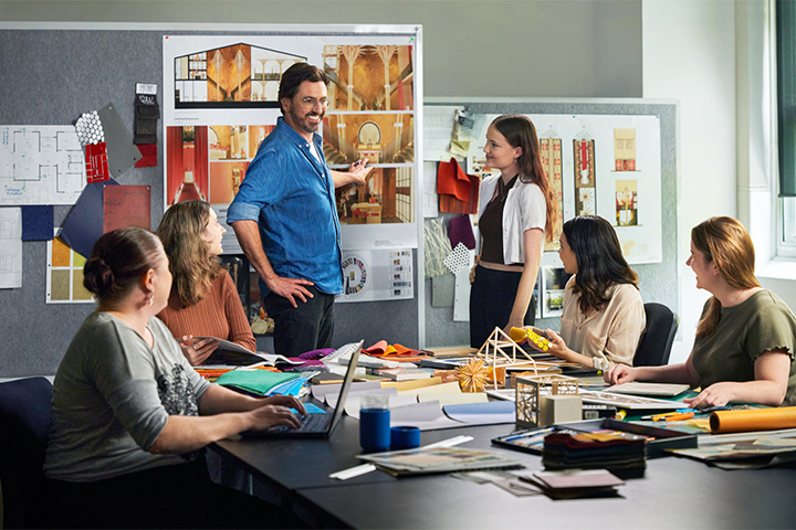Classroom setting with an Interior Design instructor and student
