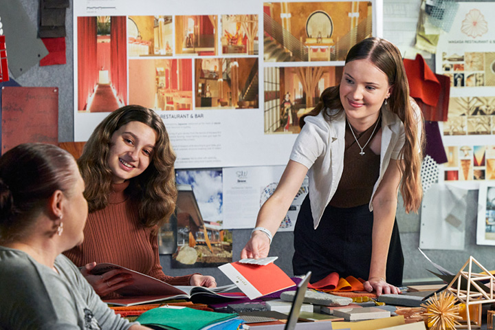 Group of female interior design students working together