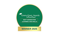 Circular Green Gown Awards badge with a gold border and graduation cap icon, featuring the text “Green Gown Awards International,” “Next Generation Learning and Skills,” and a gold ribbon stating “Winner 2025.”