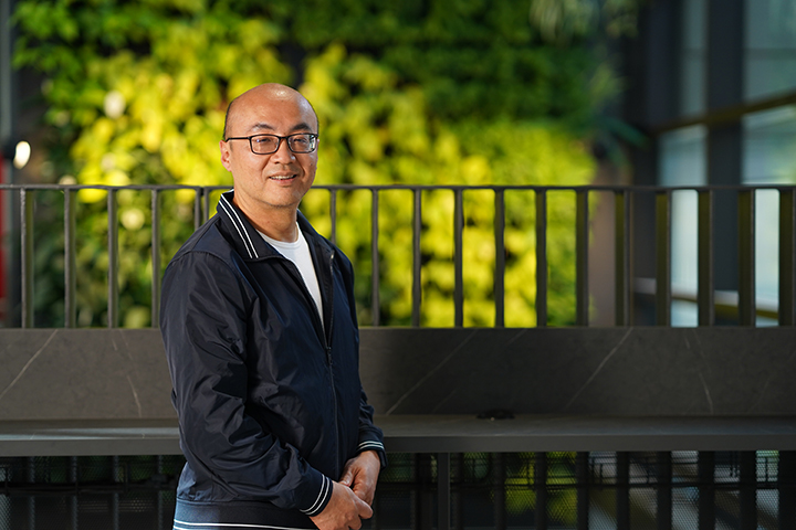 Older male student posing for a picture